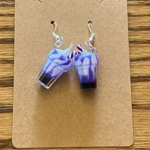 Purple milkshake earrings with silver wires and random gift bag.